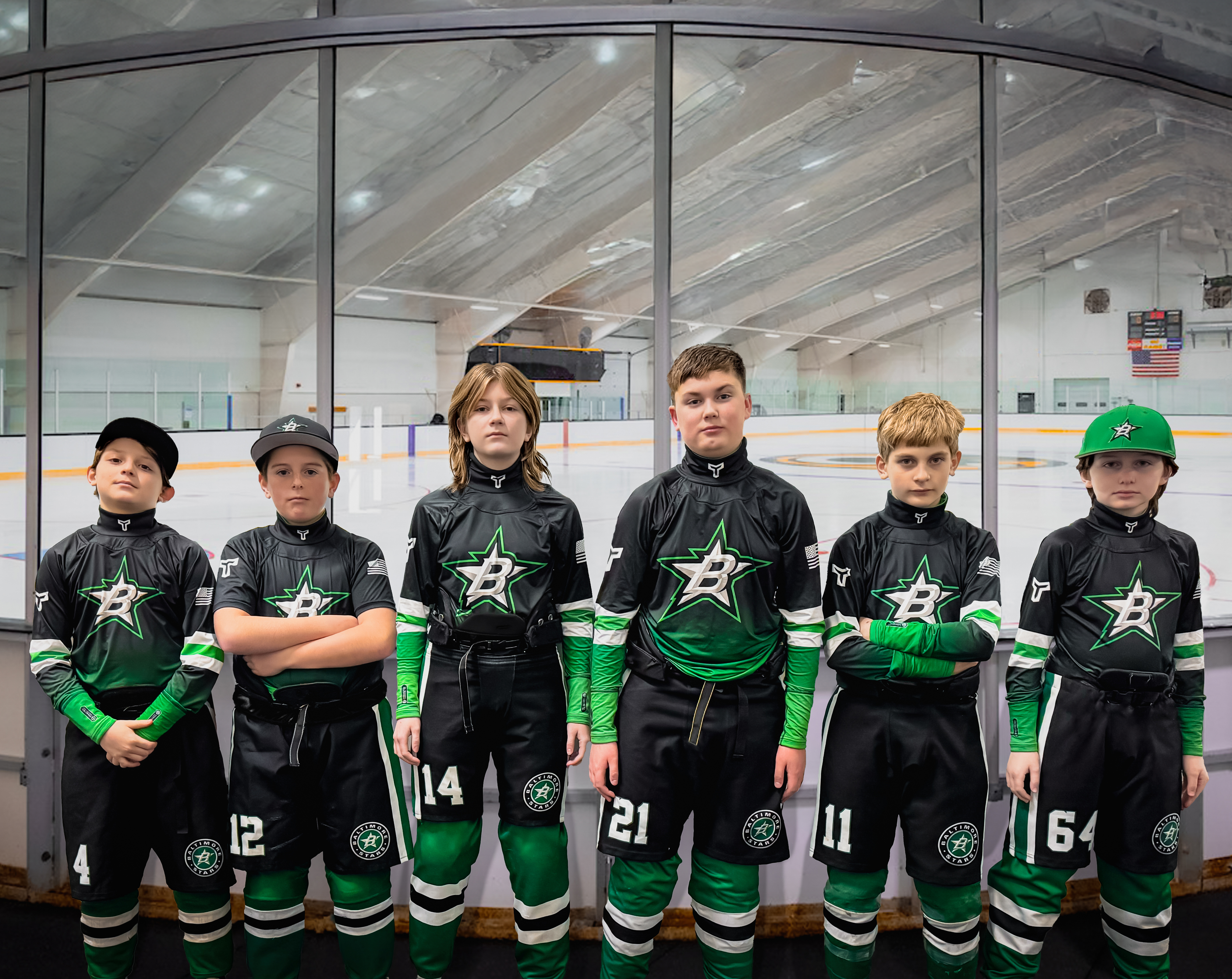 A group of young hockey players stands confidently in full Titan BattleGear custom team apparel, representing the Baltimore team. Their uniforms feature integrated cut-resistant hockey neck guards, designed for maximum protection and performance. With a sleek black and green design, the custom BattleGear program ensures teams stay safe while looking elite on the ice.