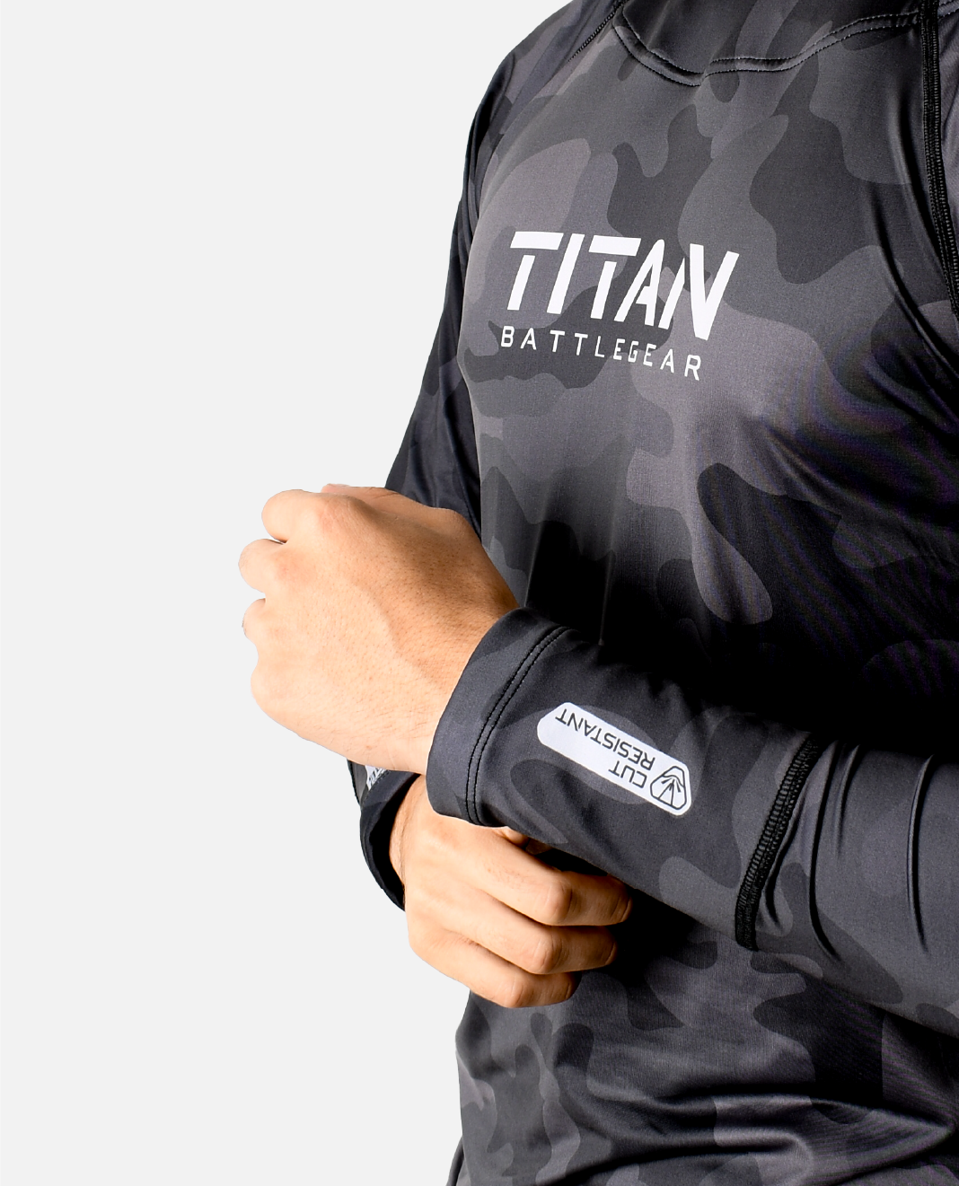 Close-up of Titan Battlegear cut-resistant camo long sleeve with integrated hockey neck guard, highlighting advanced safety features.